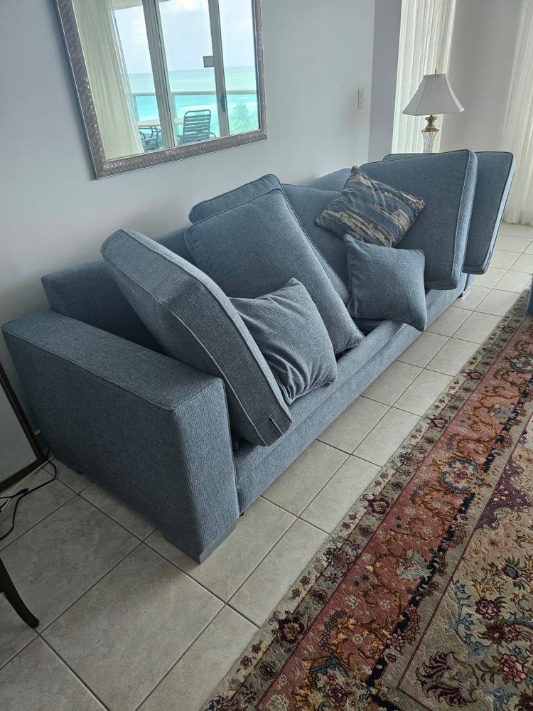 Blue sofa cleaned with upholstery steam cleaning