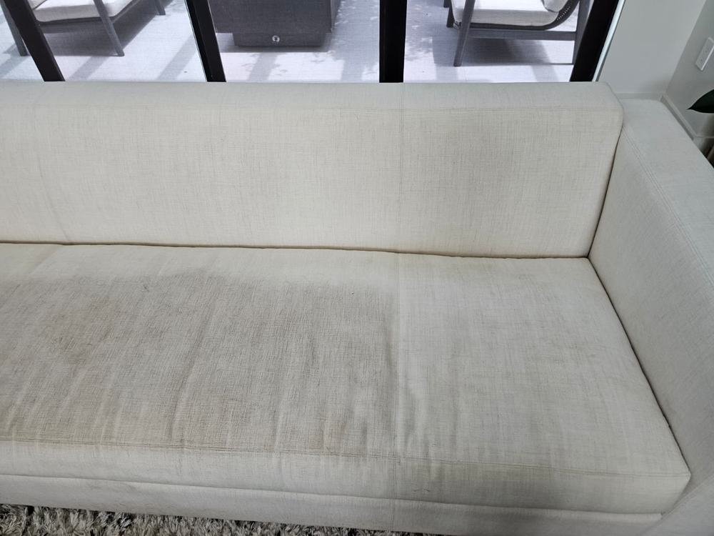 White sofa seat after upholstery cleaning