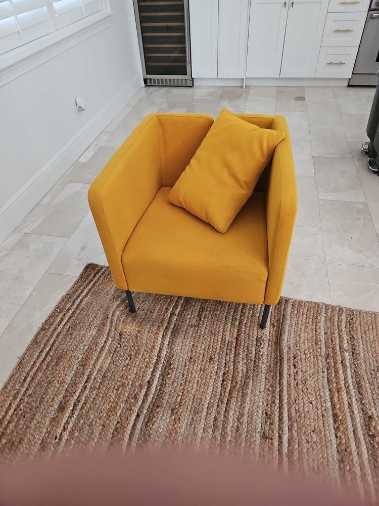 Yellow armchair after upholstery cleaning